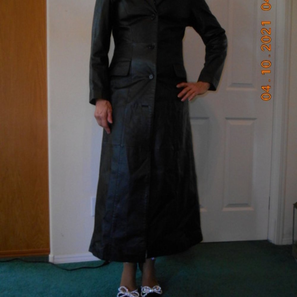 Long black leather coat.